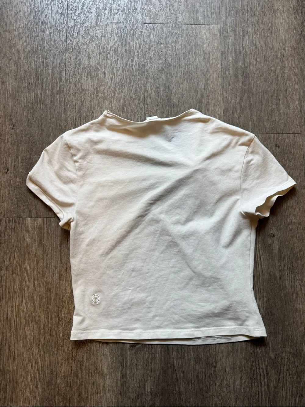Lululemon asymmetric front-twist top in cream/bone color  Size M